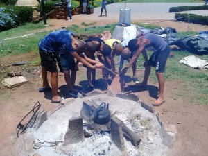 KhoiSan children came to visit here they are paying respects to the Eland